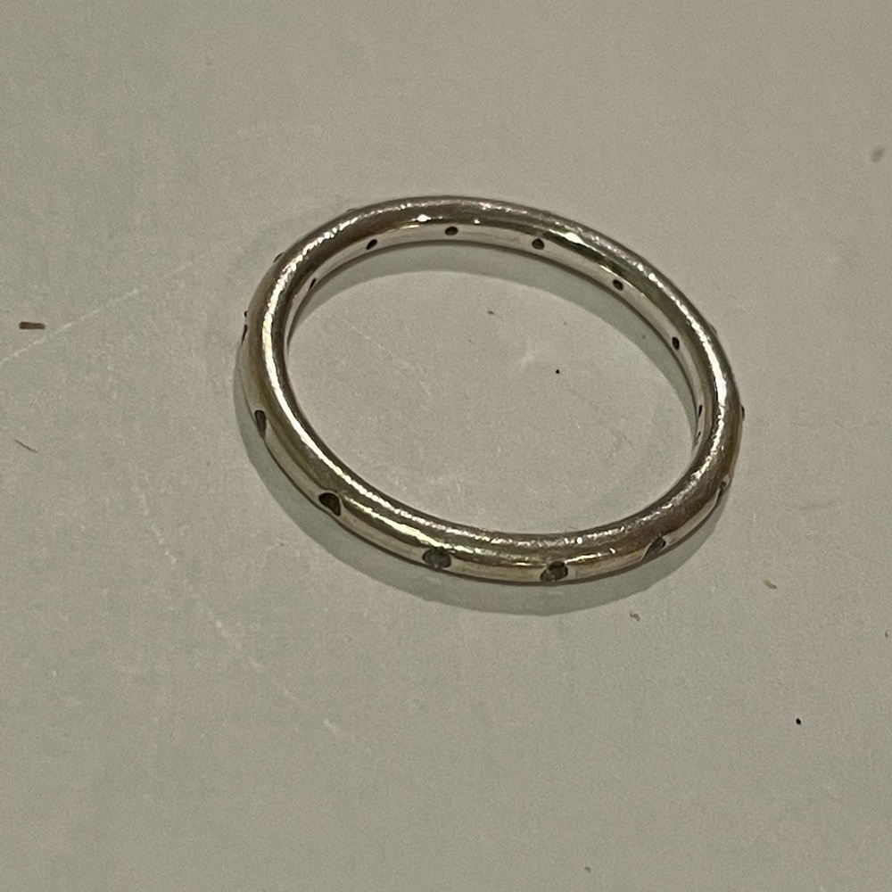 Pandora ring with diamond around